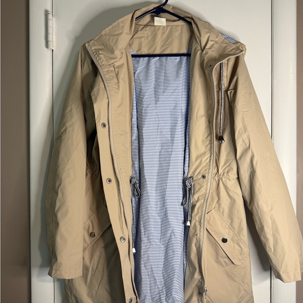 Woman’s casual stylish raincoat